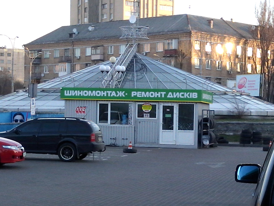 Каргополь шиномонтаж. Санкт петербург ул осипенко 2. Каргополь шиномонтаж. Шиномонтаж вид с улицы. Тип топ шиномонтаж.