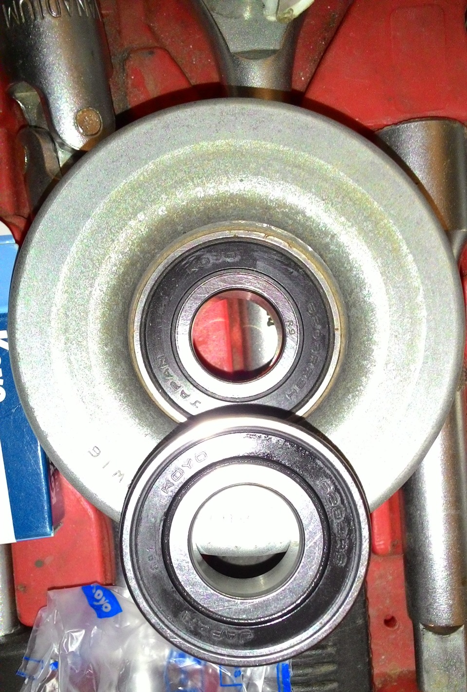 Замена подшипника в натяжном ролике навесного оборудования ...