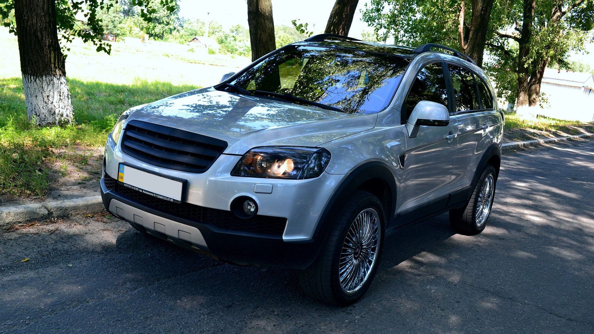 Каптива с100 2.4. Каптива 2007 2.4. Captiva Tuning 2007. Chevrolet Captiva 2007 обвес. Chevrolet Captiva c100 Black Edition.