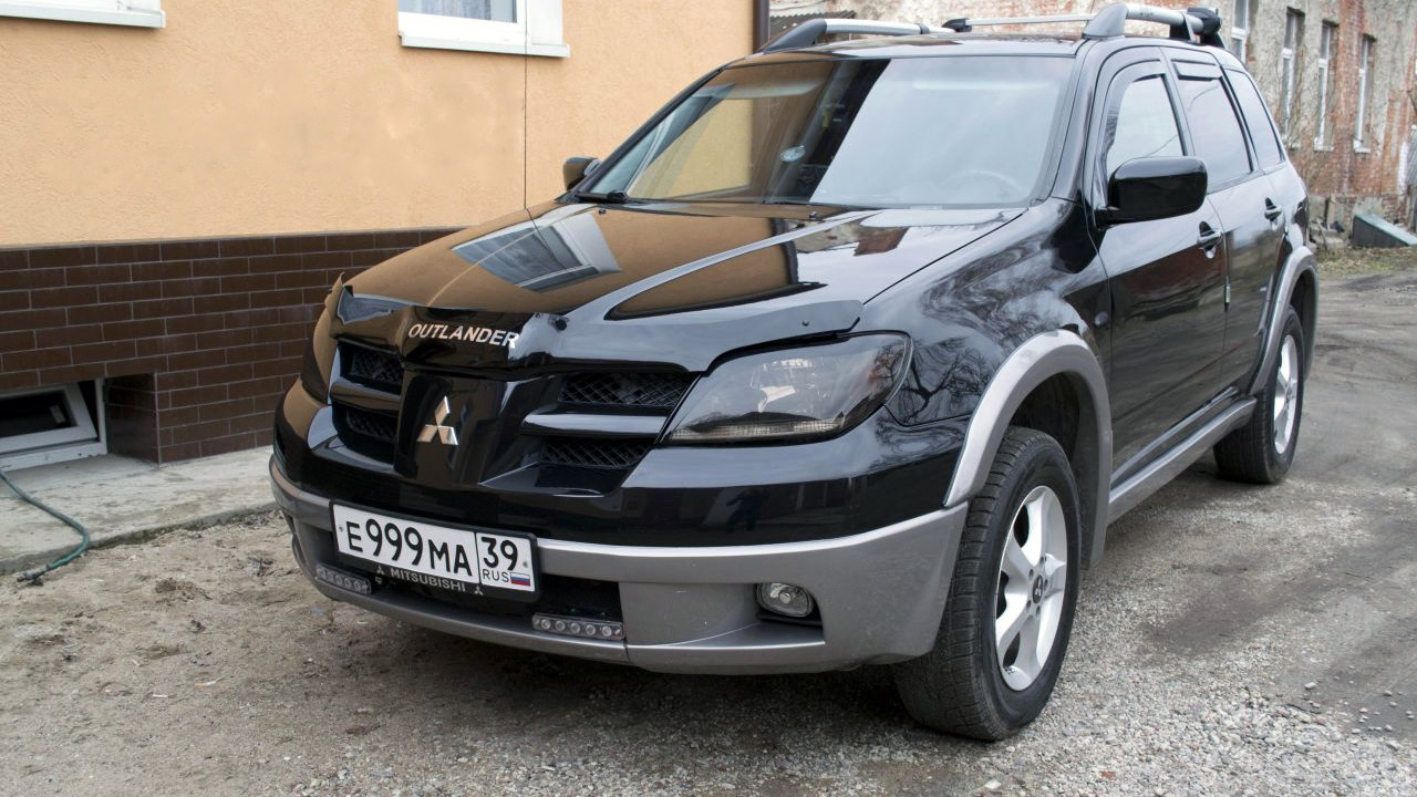 Mitsubishi Outlander (1G) 2.4 бензиновый 2003 | одноногий американец на  DRIVE2