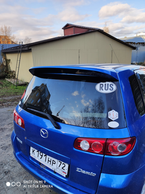 Спойлер мазда демио. Demio mazda пороги. Спойлер мазда демио 2002. Спойлер на mazda demio. Mazda demio 2000.