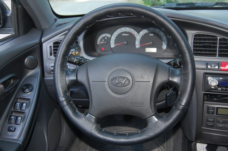 Кожаный руль hyundai elantra 2005. Руль хендай элантра 2006. Руль на элантра j3. Руль хендай элантра 3. Рулевое колесо хендай санта фе с подогревом.