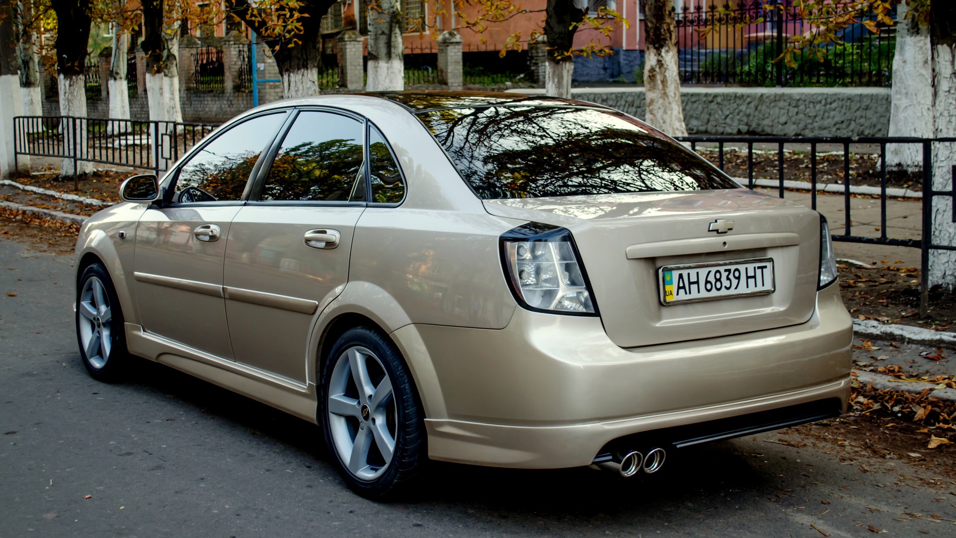 Подойдет ли передний. Chevrolet Lacetti седан юбка. Задний бампер Шевроле Лачетти седан. Юбки на Шевроле Лачетти седан. Бампер задний Lacetti седан.