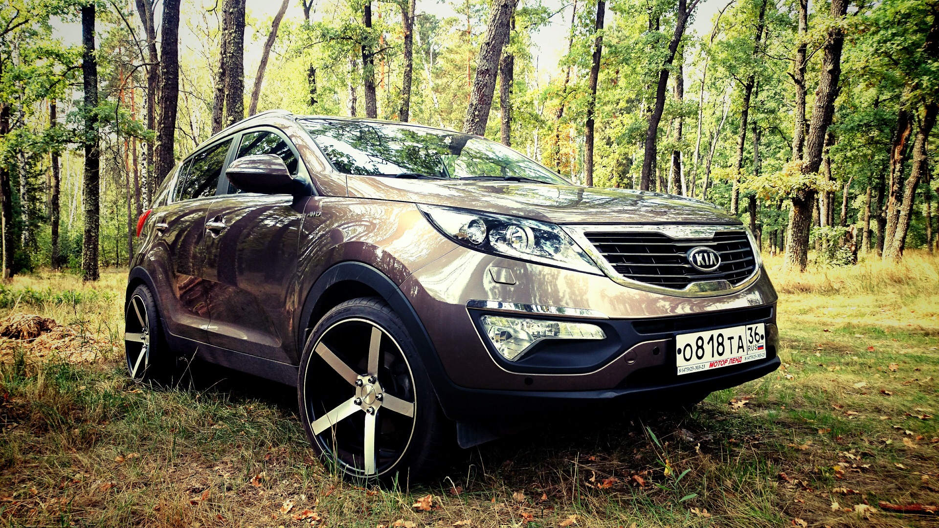 Шины кия спортейдж. Kia Sportage 3. Kia Sportage 3 r. Киа Спортейдж r21. Кия Спортейдж 3 на ВОССЕНАХ.