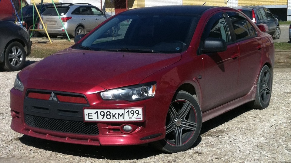 Лансер 10 замена. Mitsubishi Lancer 10 бордовый. Красно черный Митсубиси Лансер 10. Митсубиси Лансер 10 темно красный. Митсубиси Лансер 10 матовый красный.