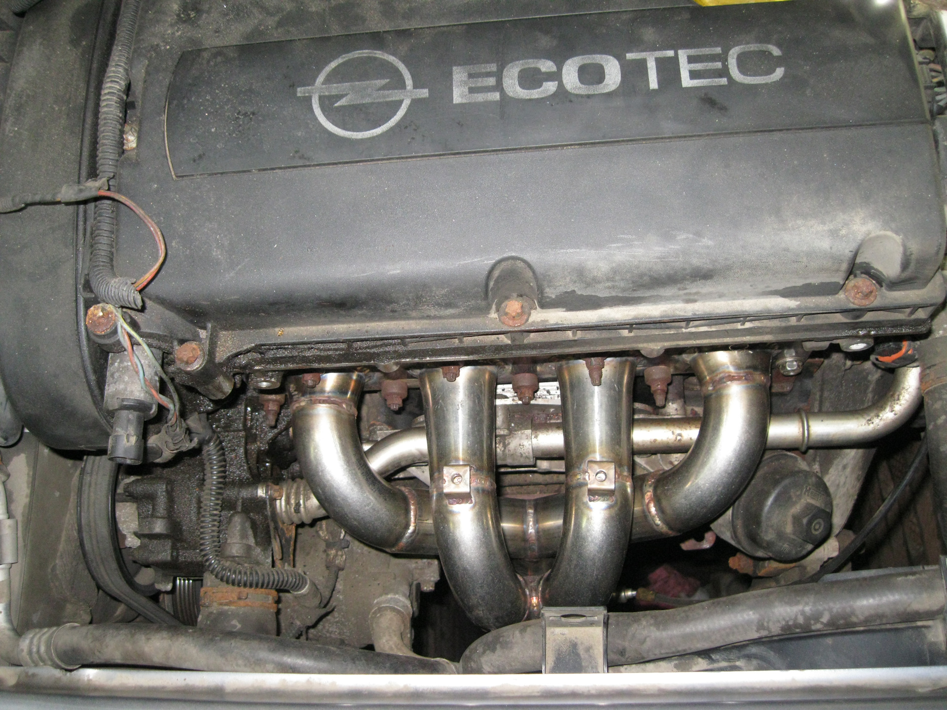 Коллектор опель зафира б. Коллектор Opel Astra h. Выпускной коллектор Опель Корса д 1.2.