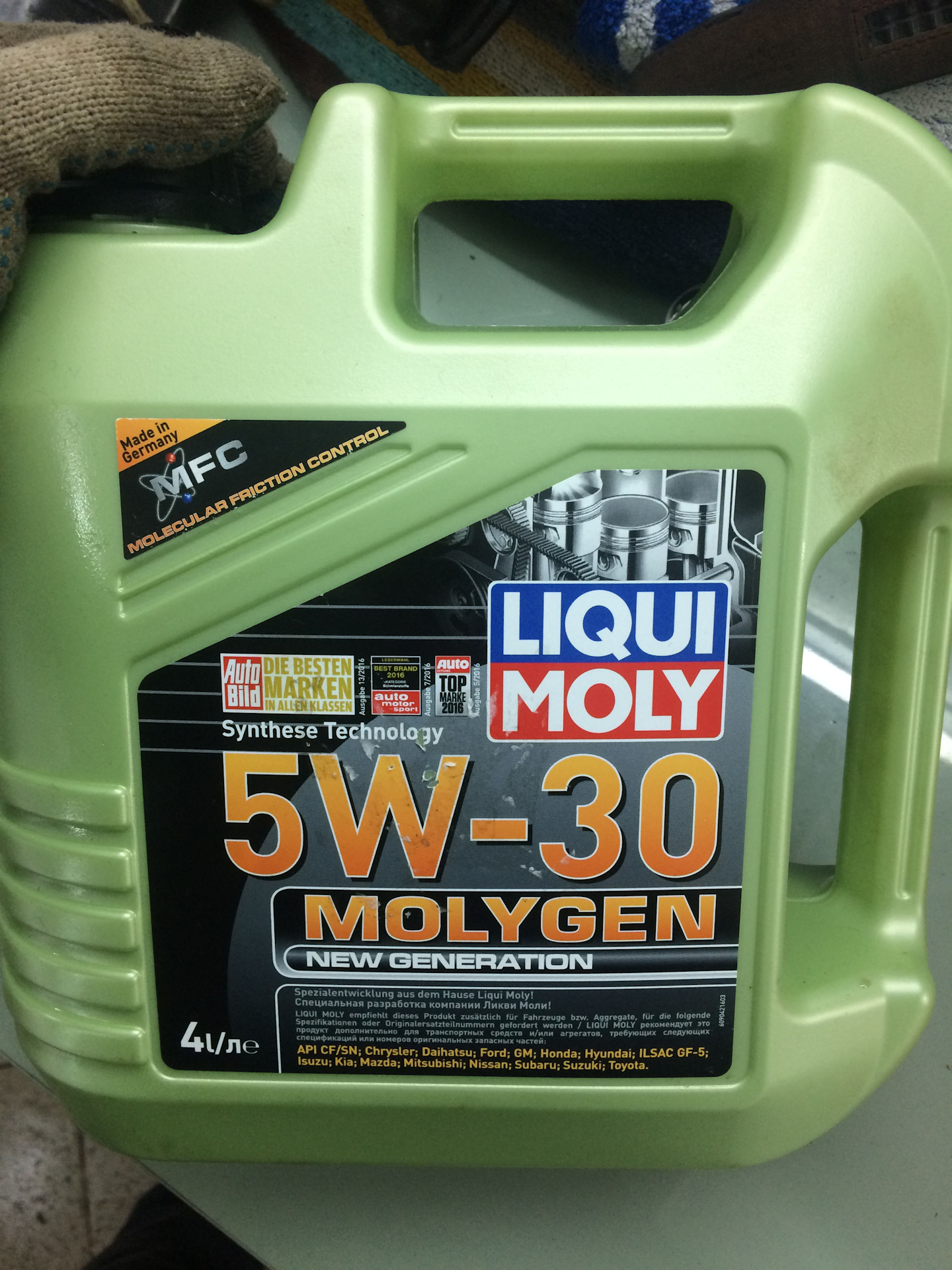 Ликви моли молиген купить. Liqui Moly Oil Filter LM-107. Ликимоле Мос масло. Тойота вская масло в банках Лики Молли фото.