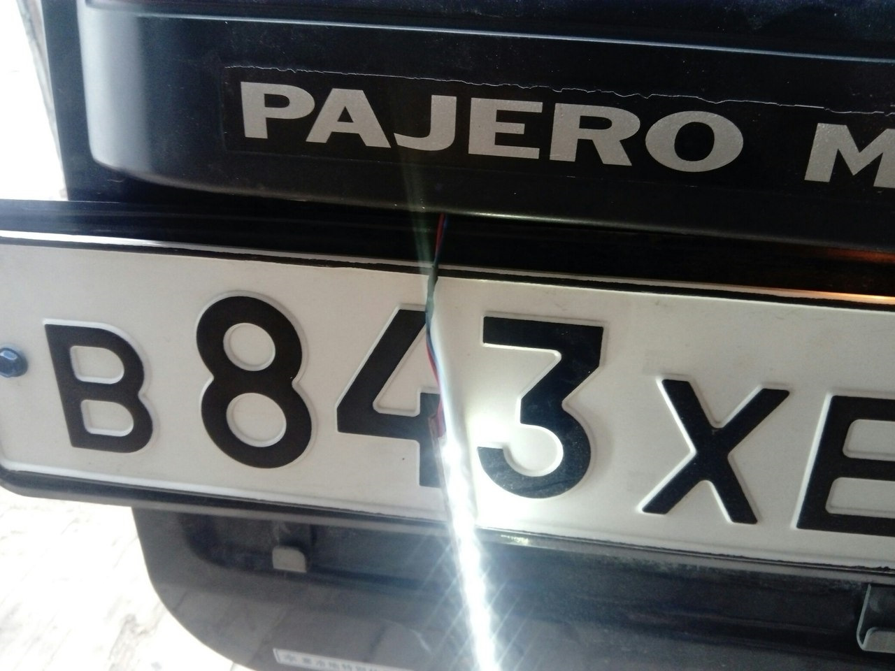 Номерной знак Pajero Sport 1