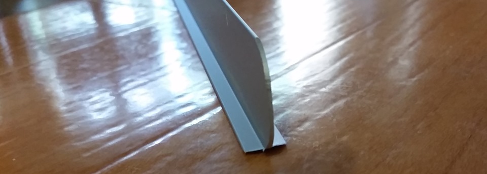 Т-образная рейка — уголок для края столешницы. Ширина Т-образной части рейки, которая входит в паз — 11 мм, длина — 95 мм. — Subaru Forester (SH)