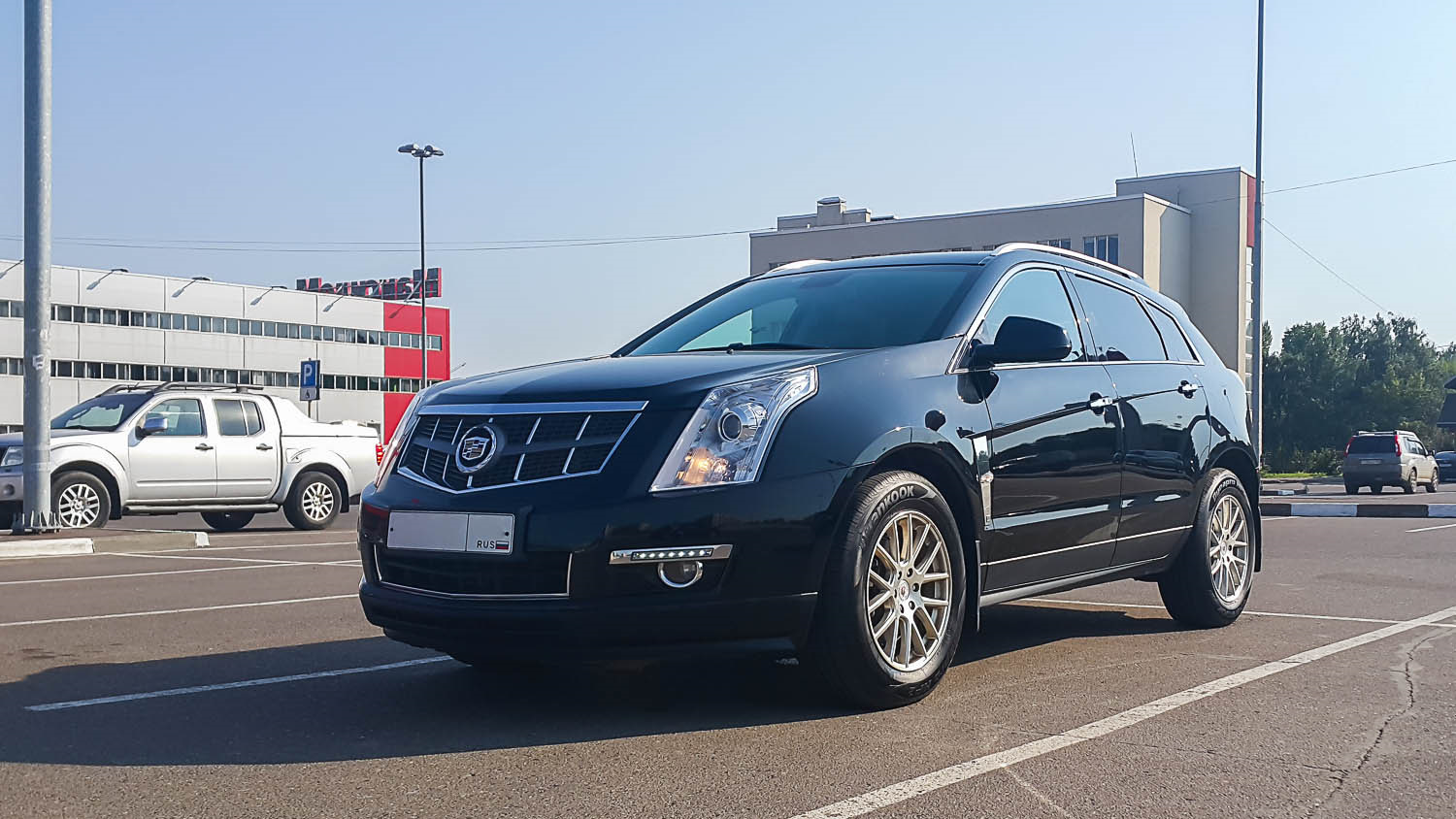 Cadillac srx отзывы. Кадиллак SRX 2. Cadillac SRX 2012. Cadillac SRX (2g). Кадиллак СРХ 2012 2.