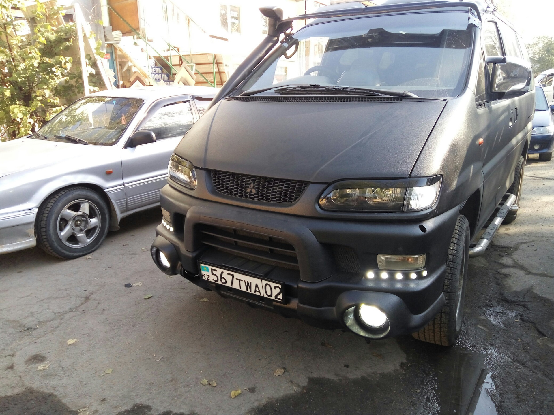 Тюнинг delica. Mitsubishi l400. Мицубиси Делика л400. Delica Mitsubishi l400 фары. Делика л400 аудиосистема.