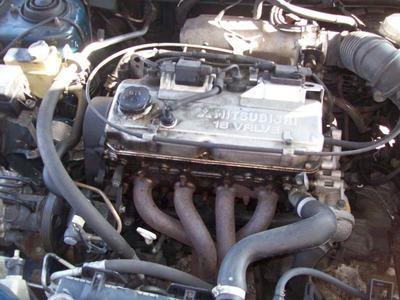 Мицубиси каризма двигатели. Двигатель Мицубиси Каризма 1. Двигатель Митсубиси Каризма 1.6. Mitsubishi Carisma 2002 мотор 1.8. Mitsubishi Carisma 1997 год 1.6 двигатель.