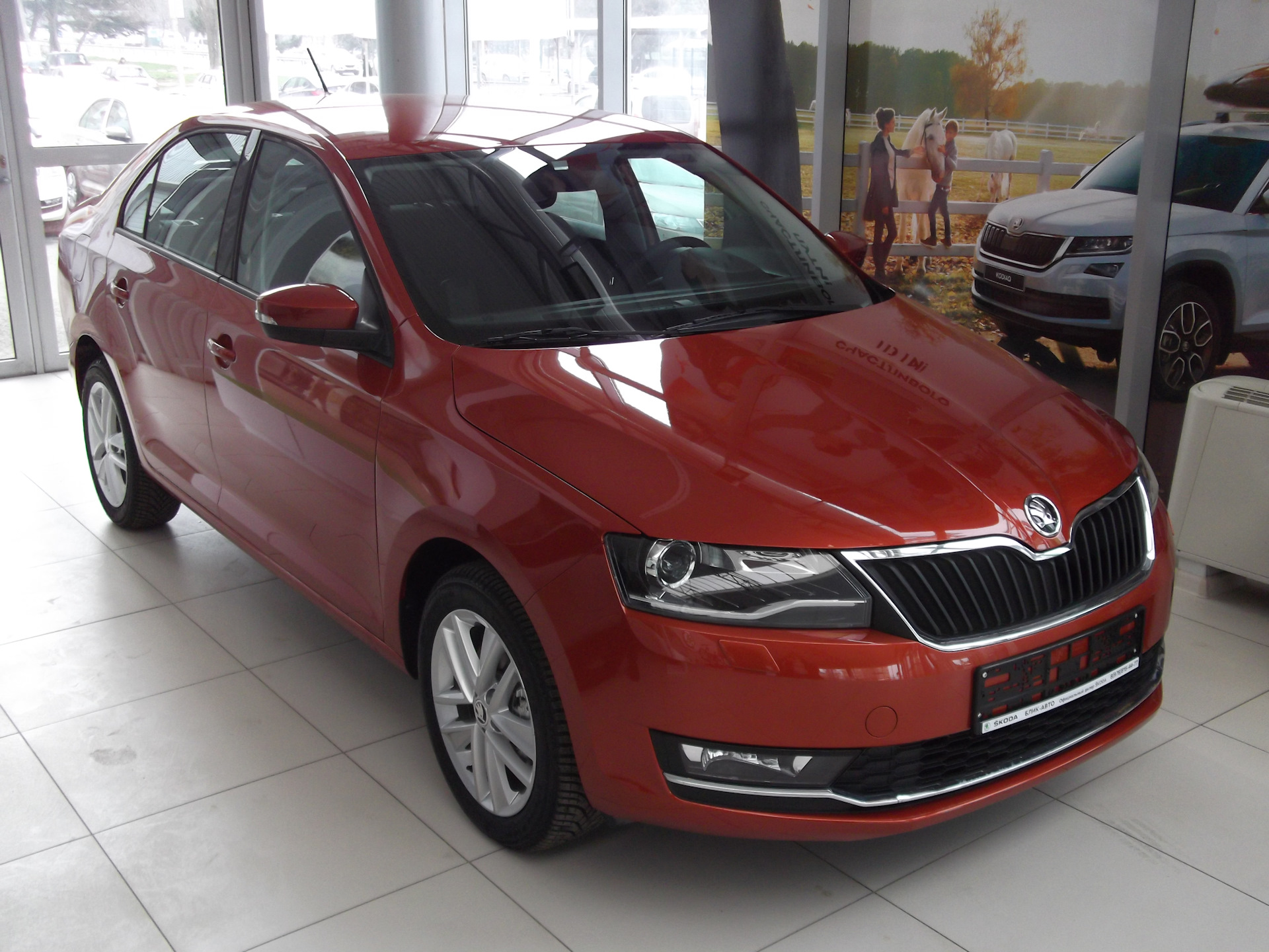 Красный Ruby Skoda Rapid