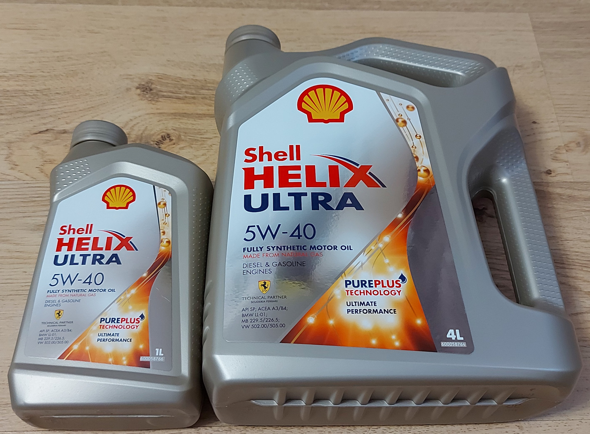 Масло шелл хеликс ест. Shell Helix Ultra 5w40 SP. Helix Ultra 5w-40 SP. Helix Ultra ow-40. Моторное масло Shell Helix Ultra 5w-30.