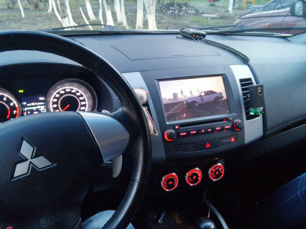 Mitsubishi outlander xl замена. Магнитола на Аутлендер XL 2011. Магнитола Tesla в Outlander XL 2011. Экран Mitsubishi Outlander XL. Магнитола Mitsubishi Outlander XL Android Tesla.