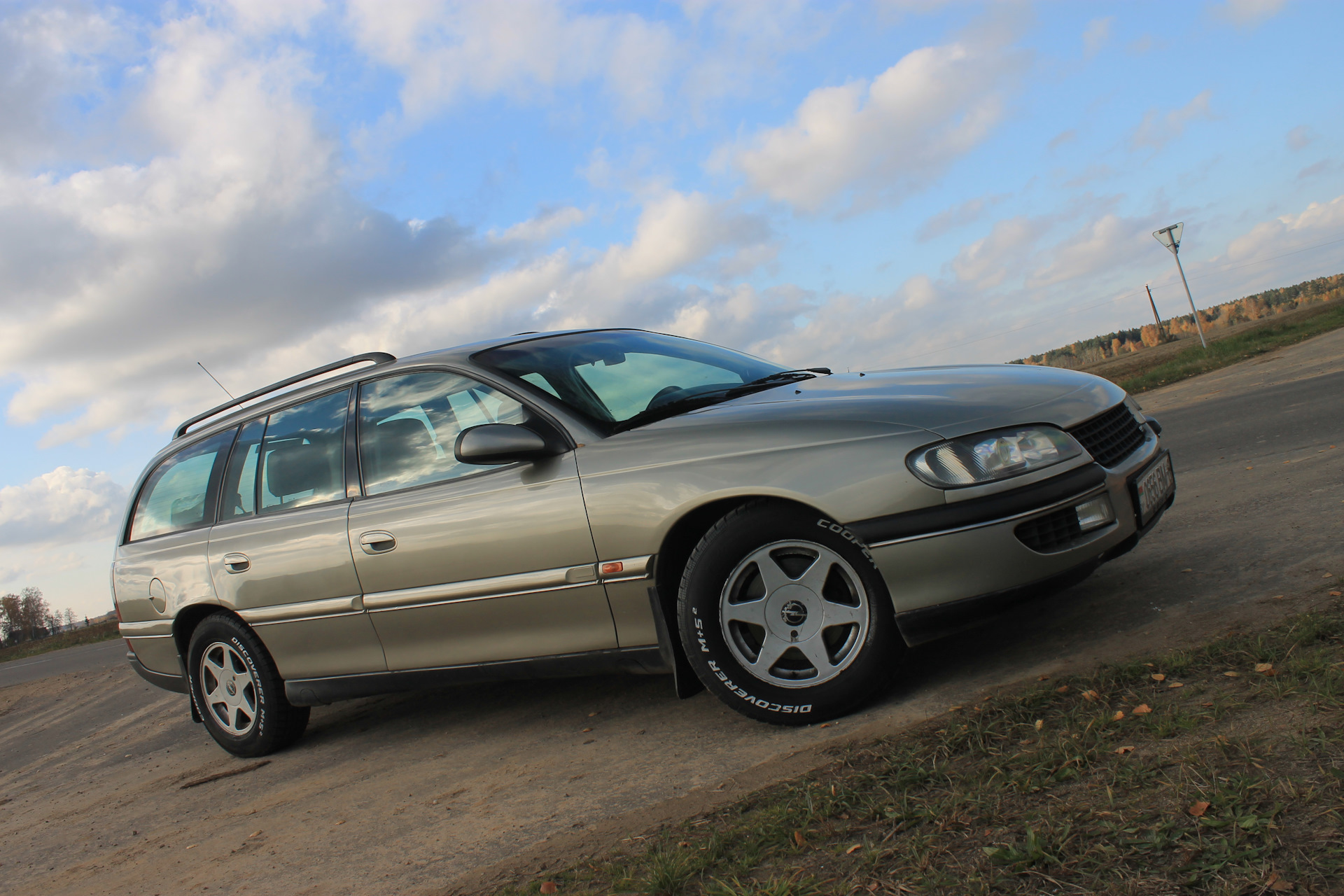 шины opel omega. 1002130 opel. Opel omega b r18. Opel omega b gm диски. Opel omega r17.