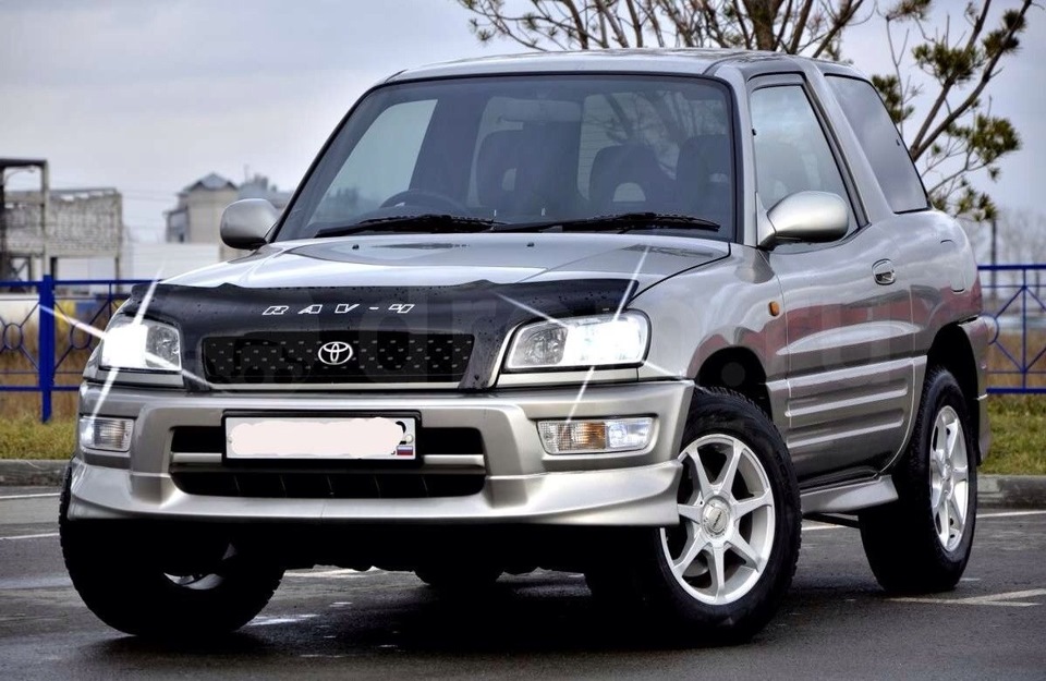 4 первое. Toyota RAV 4 1999 2 поколение. Губа Тойота рав 4 1 поколение. РАФ В обвесе 2-поколение. Рав 4 1 поколение спокйлео.