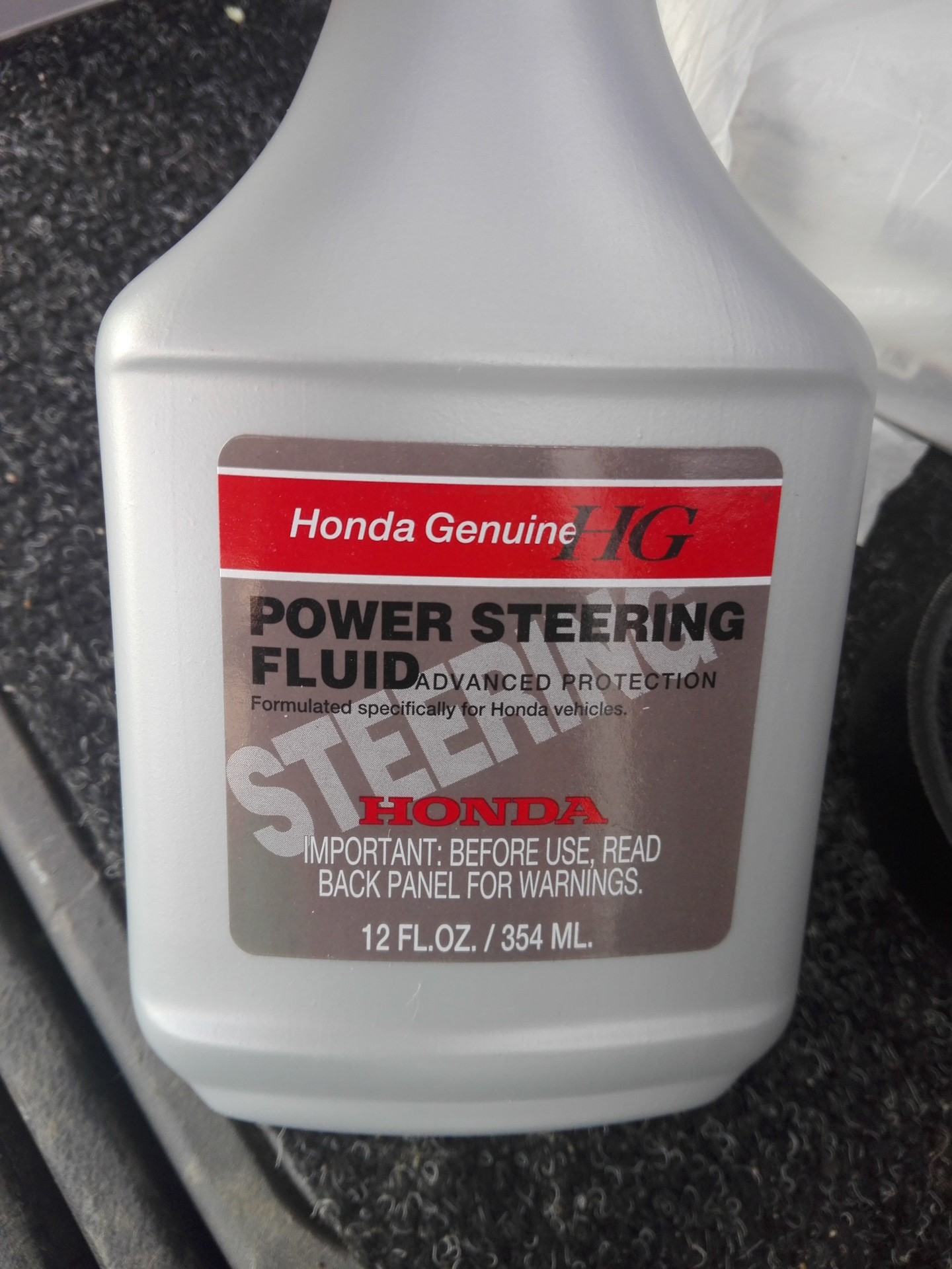 Масло гидроусилителя хонда. Honda Genuine Power Steering Fluid. 082069002 Honda. Жидкость в ГУР Хонда элемент. 082069002.