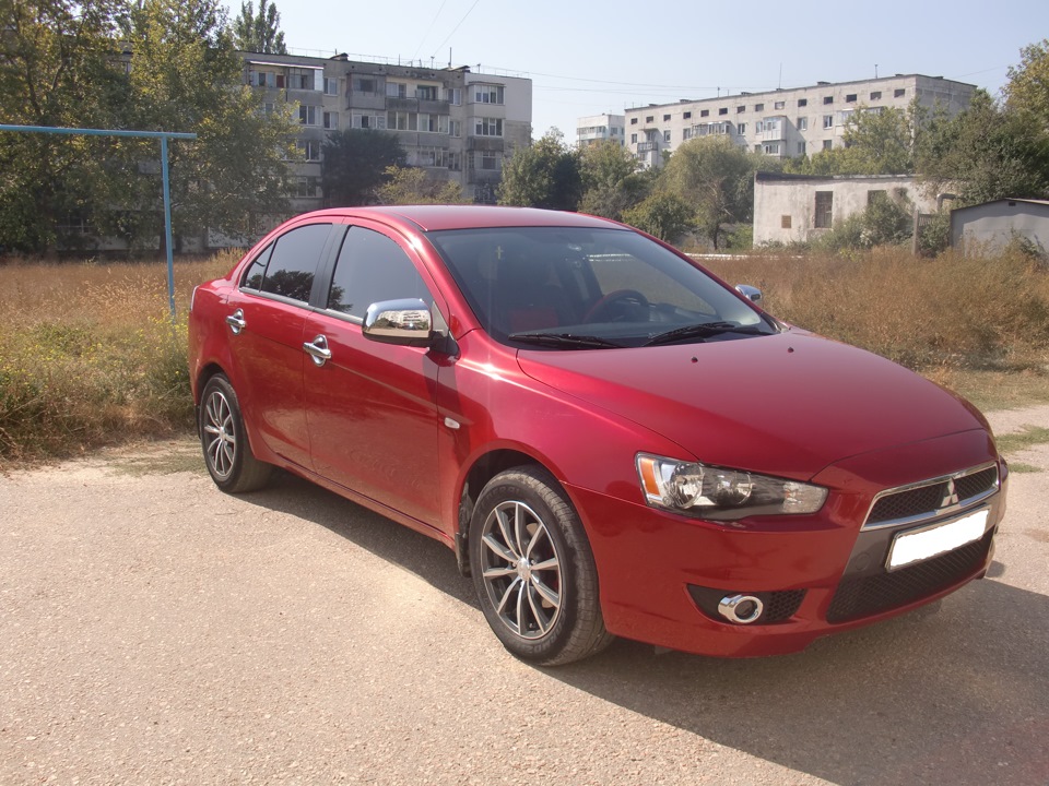 Лансер 10 авито. Митсубиси Лансер красный 2010. Mitsubishi Lancer 10 цвет красный. Митсубиси Лансер 10 расцветки. Митсубиси Лансер 10 красного цвета.