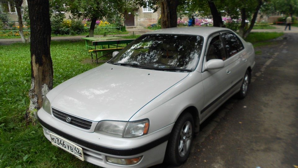 Корона 95 года. Toyota Corona 1995. Toyota Corona t190. Белый перламутр Тойота корона АТ 190. Тойота белая 1995.