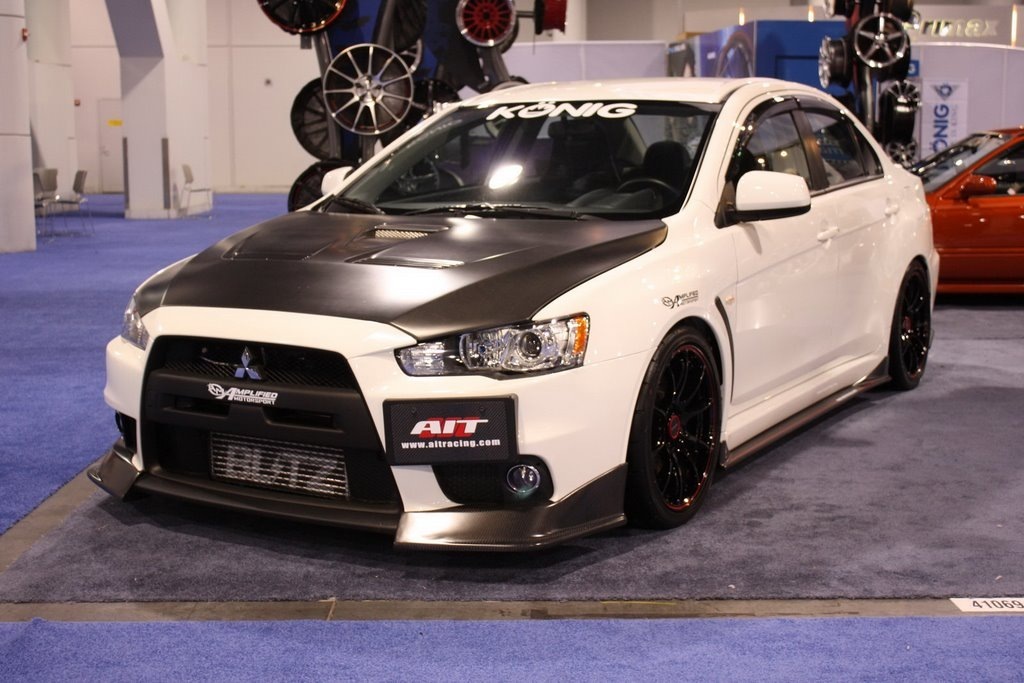 ВЫБОР ПЕРЕДНЫХ ФАР из 2-х указанных. - Mitsubishi Lancer X, 1,5 л, 2010 года эле