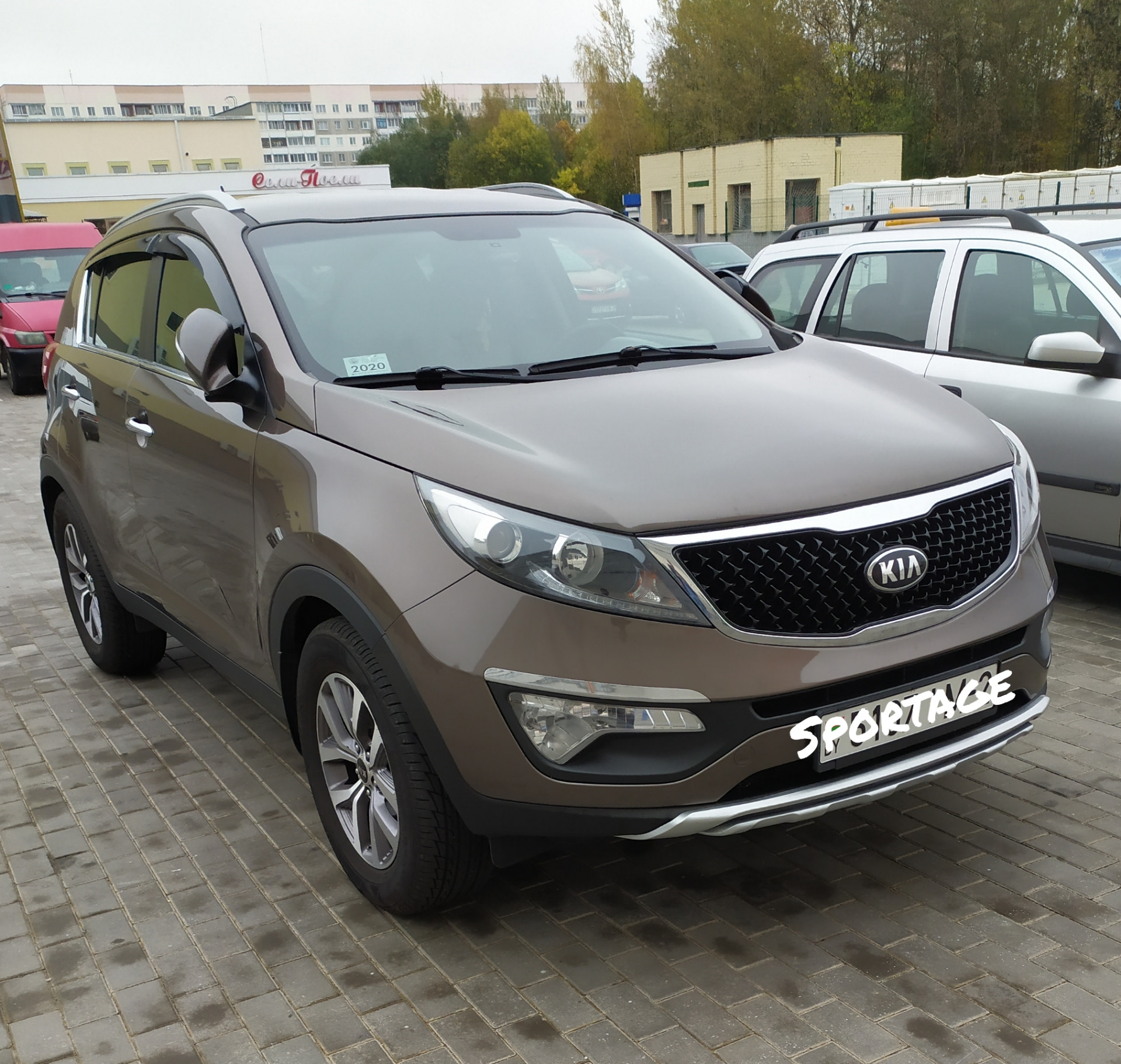 Накладки на бампера — KIA Sportage (3G), 2 л, 2015 года | тюнинг | DRIVE2