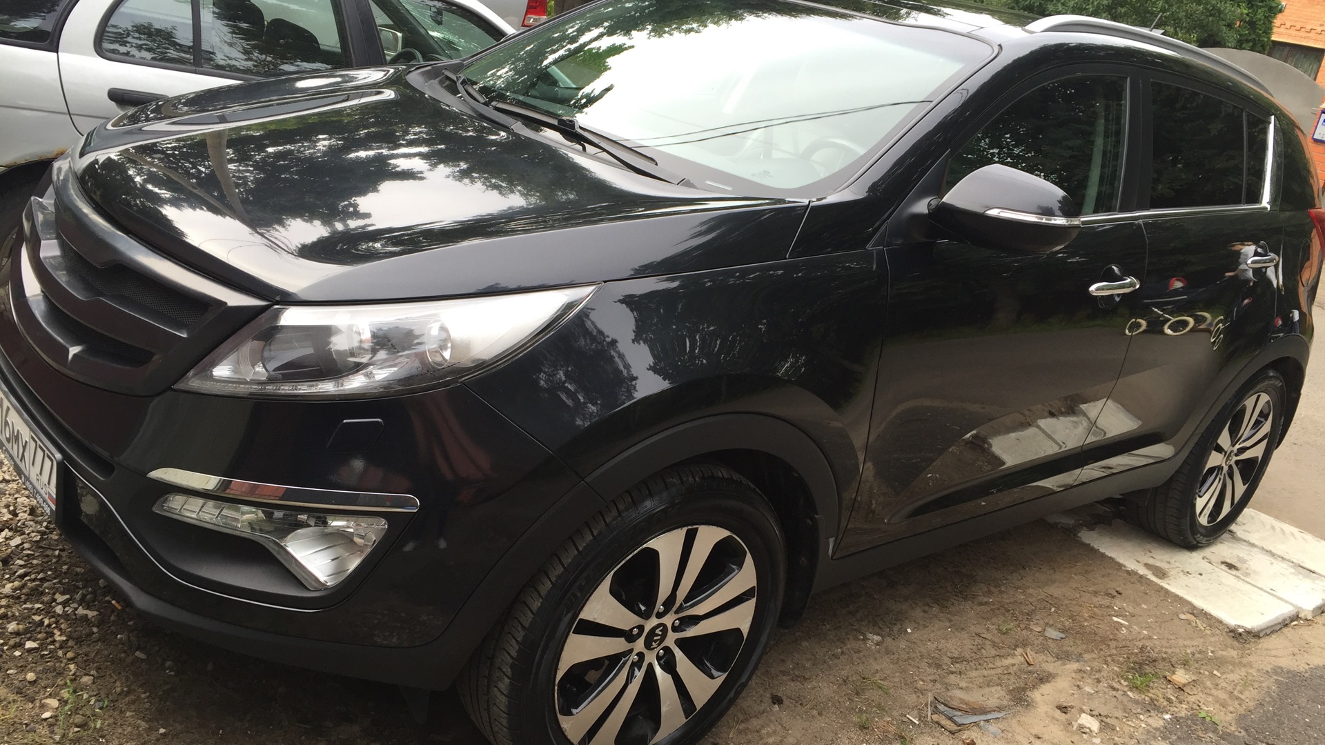 KIA Sportage (3G) 2.0 бензиновый 2011 | черный паркетник на DRIVE2