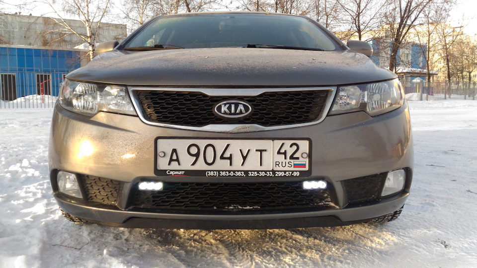 Как подключить функцию автоматического включения ДХО Kia Cerato II