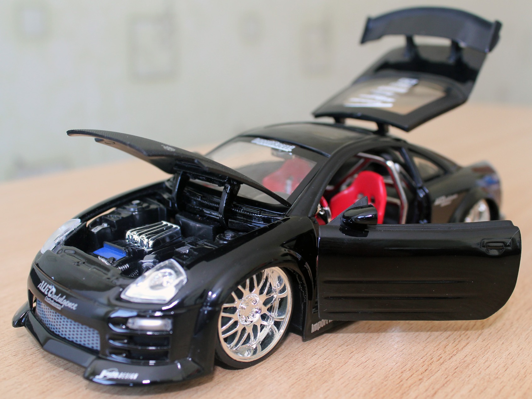 Сделай 1 24. Mitsubishi Eclipse 1/24. Mitsubishi Eclipse 3 модель. Jada 1 24 Mitsubishi Eclipse Import Racer. Модель Мицубиси Эклипс 3g.