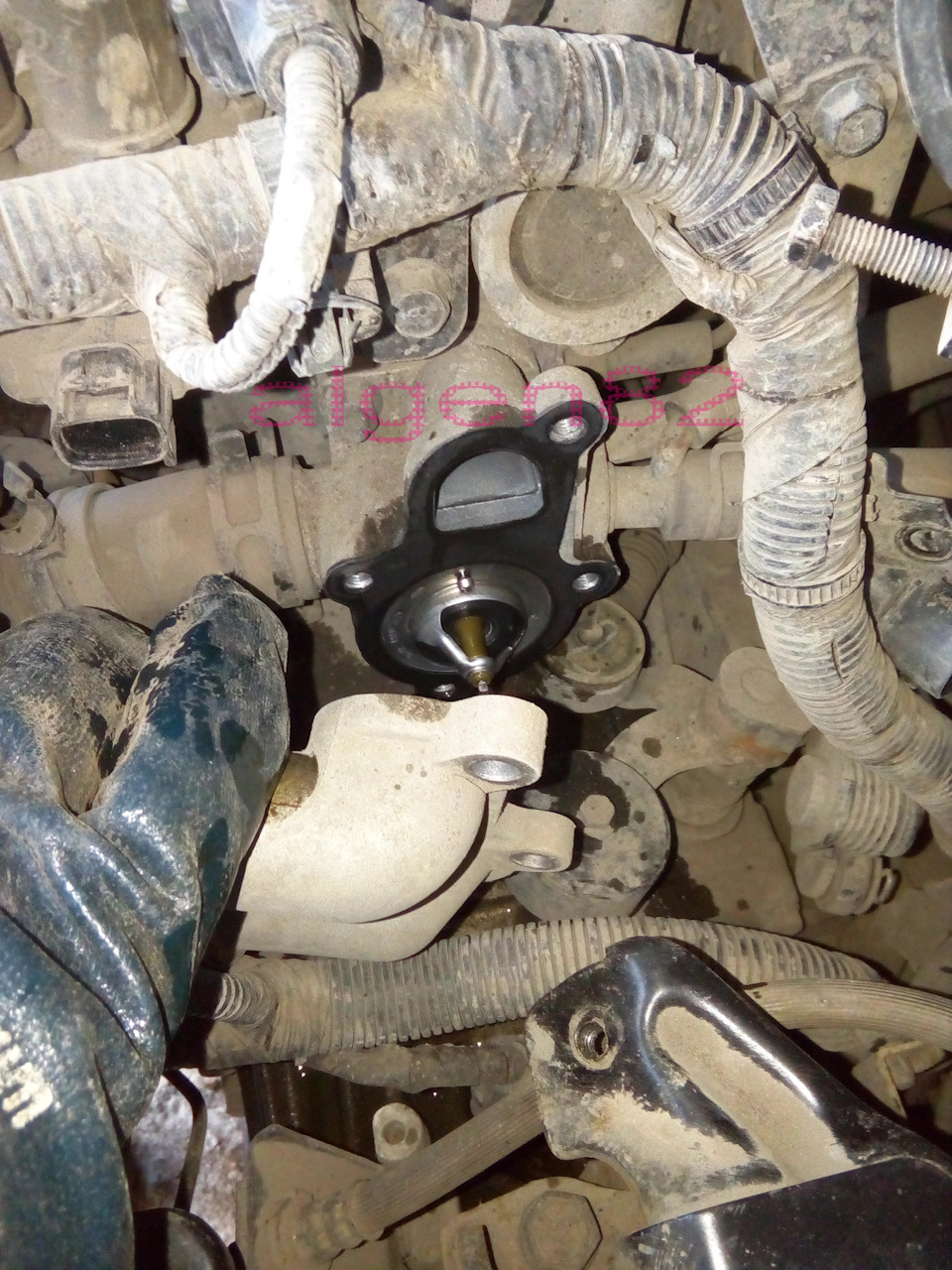 смена термостата, прокладки его, свечей, левой косточки, втулок стаба ...