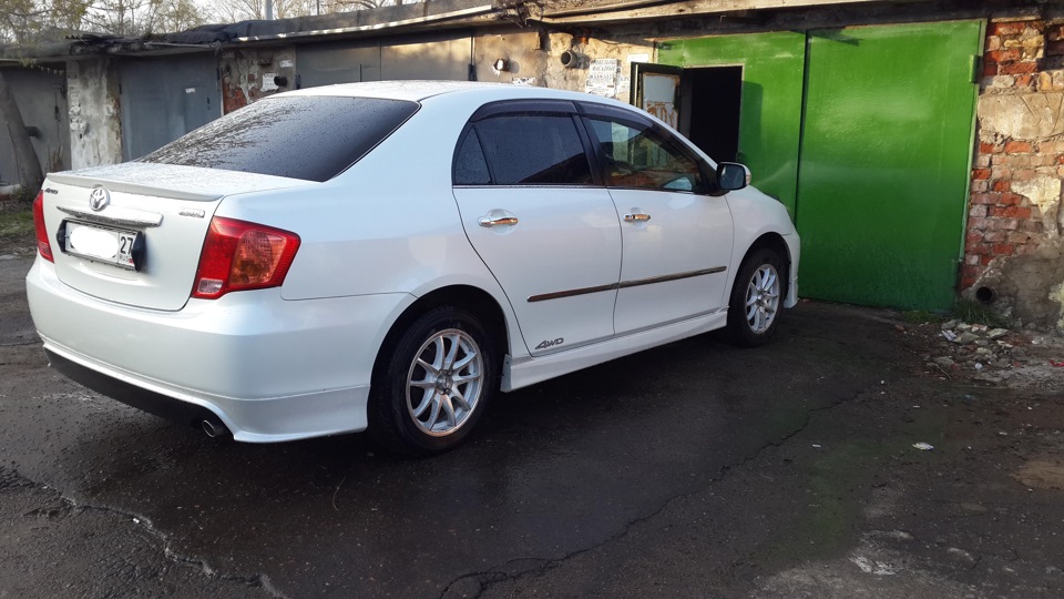 Сомон тч королла 3. Тойота Королла Аксио 141 кузов. Toyota Corolla Axio со спойлерами. Обвесы на Corolla Axio 2008. Тойота Аксио 2008.