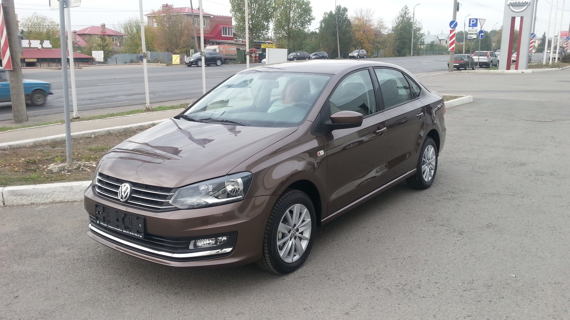 Volkswagen Polo sedan коричневый