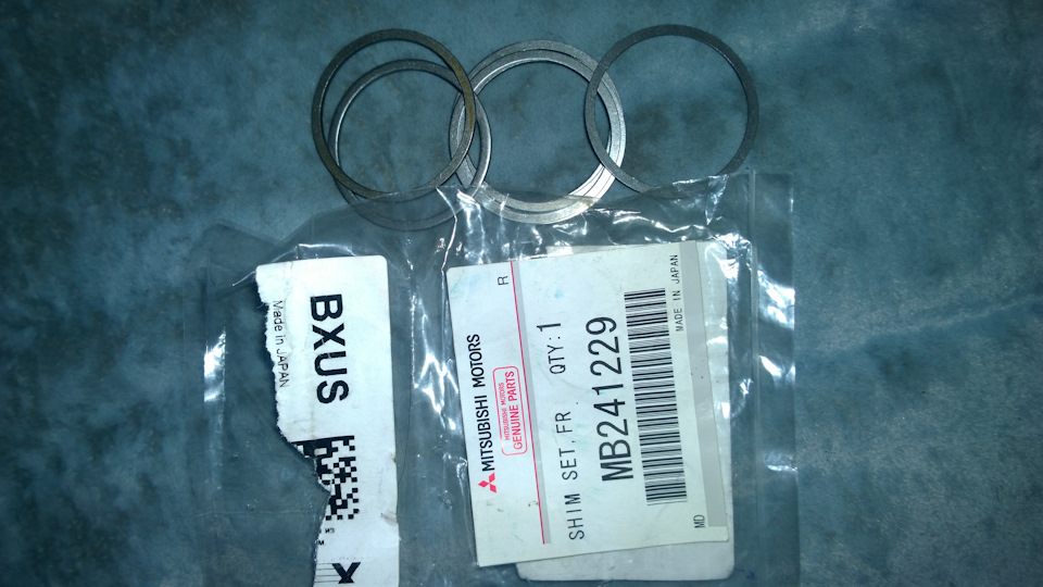 MB241229 ПРОКЛАДКИ РЕГУЛ., СТУП.ПЕР.КОЛЕС Mitsubishi | Запчасти на DRIVE2
