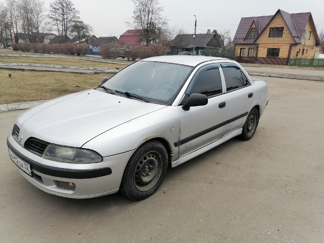 Carisma 2002. Митсубиси Каризма 2002. Mitsubishi Carisma 2002 Рестайлинг. Белая Митсубиси Каризма 2002. Mitsubishi Carisma универсал.