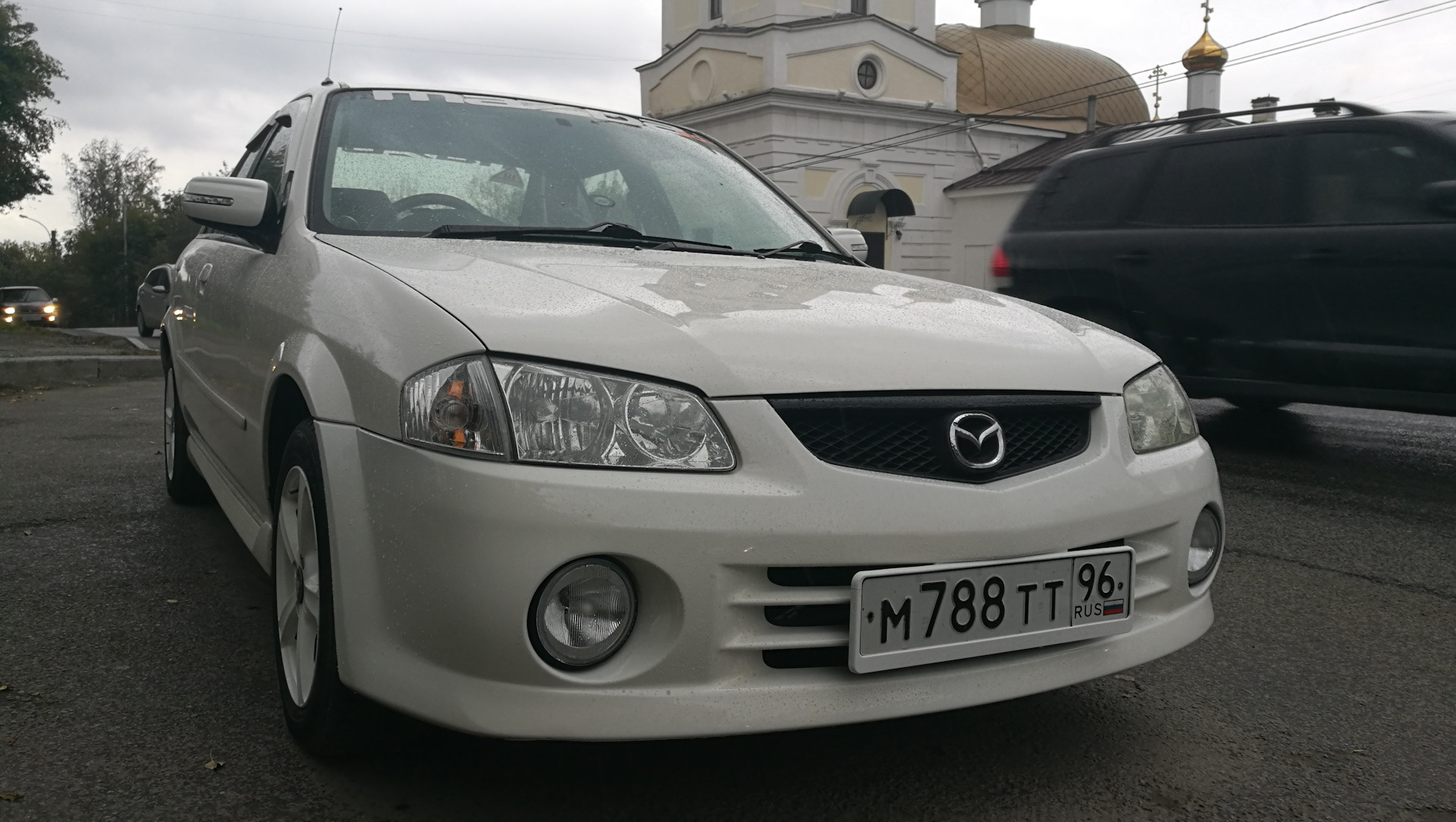 Mazda familia Рестайлинг