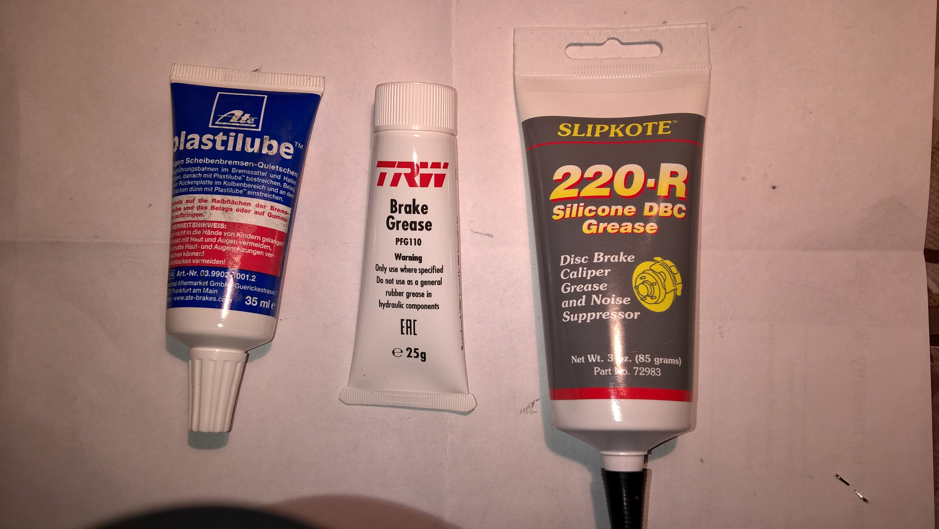 220 r. Huskey Slipkote 220r. Slipkote 220-r Silicone DBC Grease:. Slipkote 220-r Silicone Disc Brake Caliper Grease and Noise Suppressor. Slipkote 211 Silicone DBC Grease.