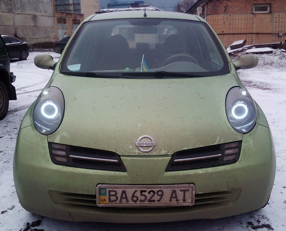 Фара марч. Ниссан Марч к12. Ниссан Микра к12. Фары Nissan Micra k12. Ниссан Марч 2009.