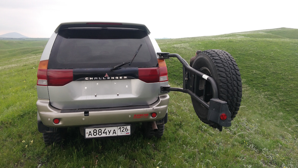 Бак вместо запаски на митсубиси паджеро спорт 2