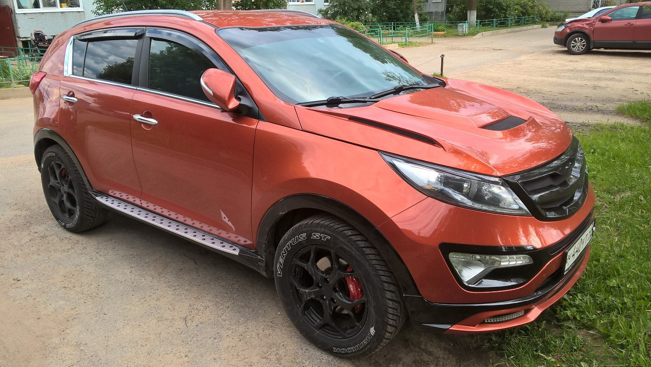 Kia Sportage 3 оранжевый