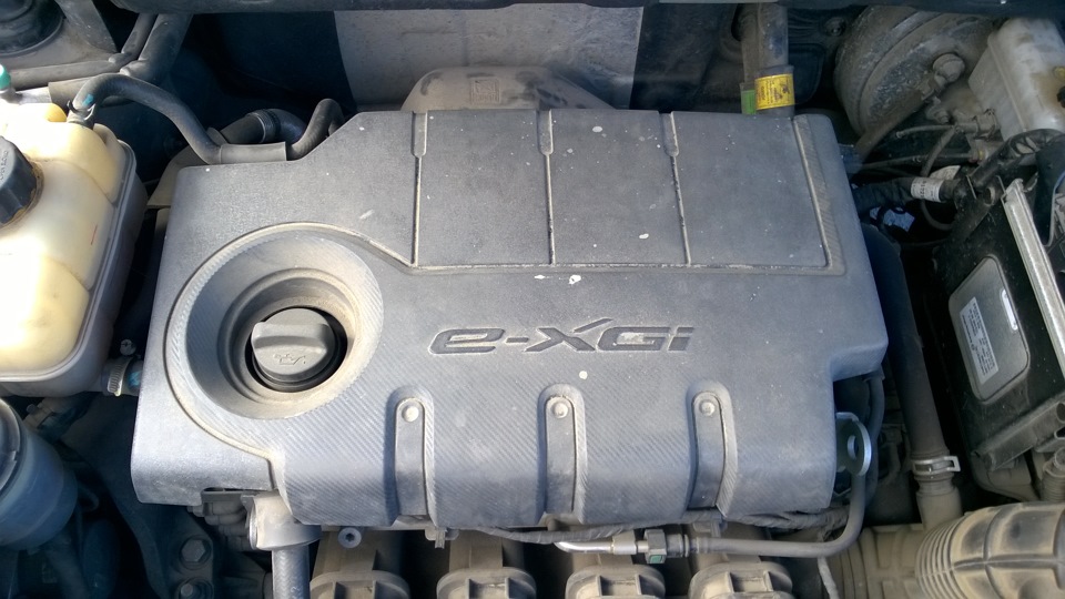 Саньенг номер двигателя. SSANGYONG Actyon 2012 2.0 бензин. Номер двигателя Актион 2.0 бензин 2013. SSANGYONG Actyon 2.0 бензин моторный отсек. Номер двигателя на SSANGYONG New Actyon 2013.