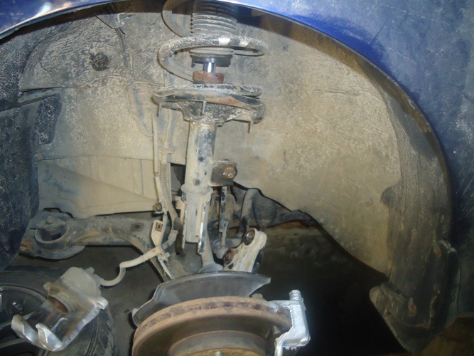 Замена подшипника опоры передней стойки — Hyundai Elantra (4G), 1,6 л ...