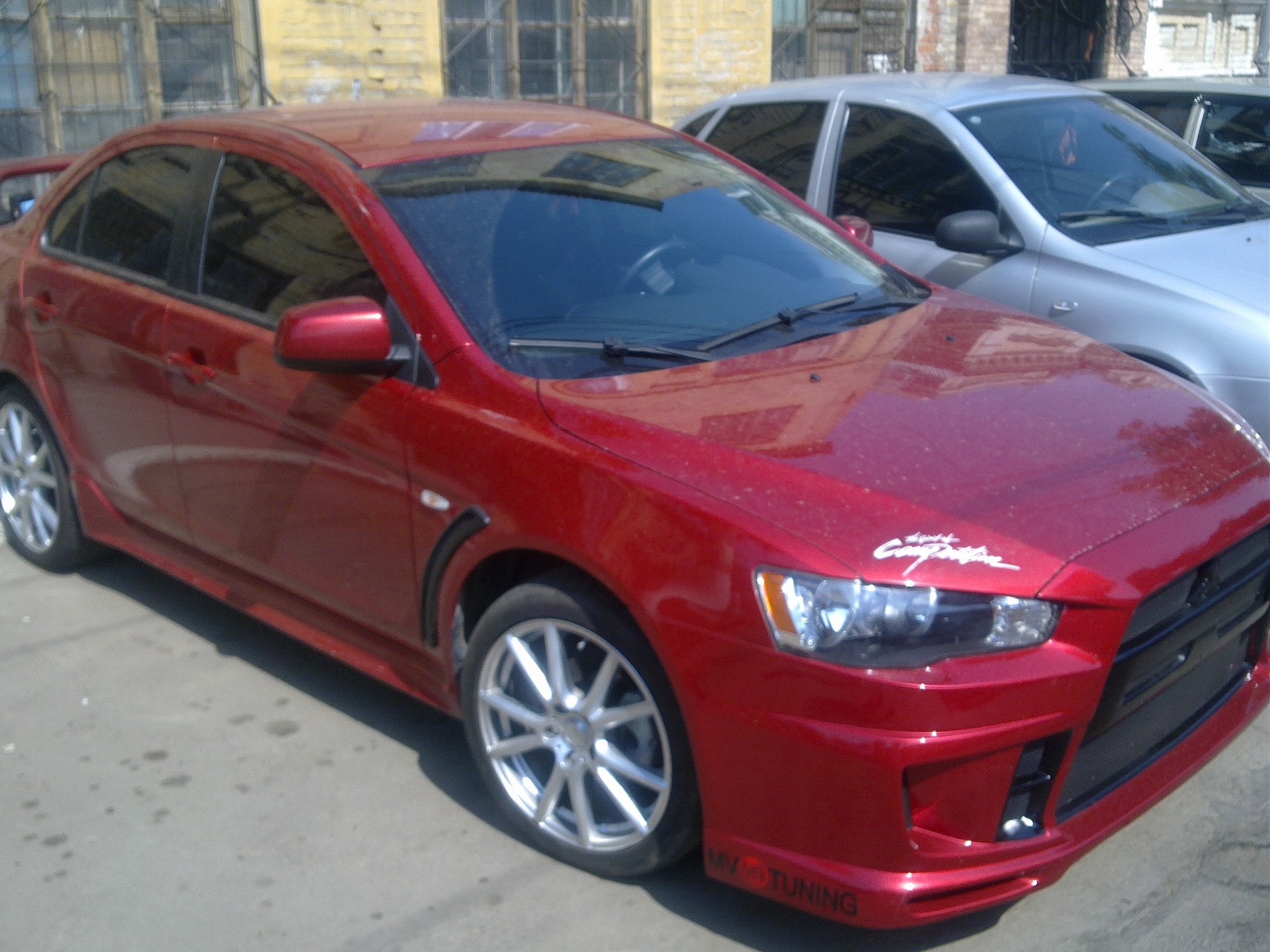 Красный разбор. Mitsubishi Lancer 10 Tuning красный. Красный глянец Мицубиси Лансер 10. Лансер 10 красный в обвесе.