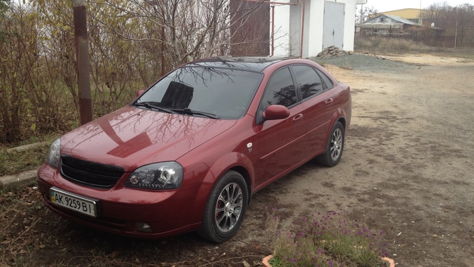 Chevrolet Lacetti седан бордовый