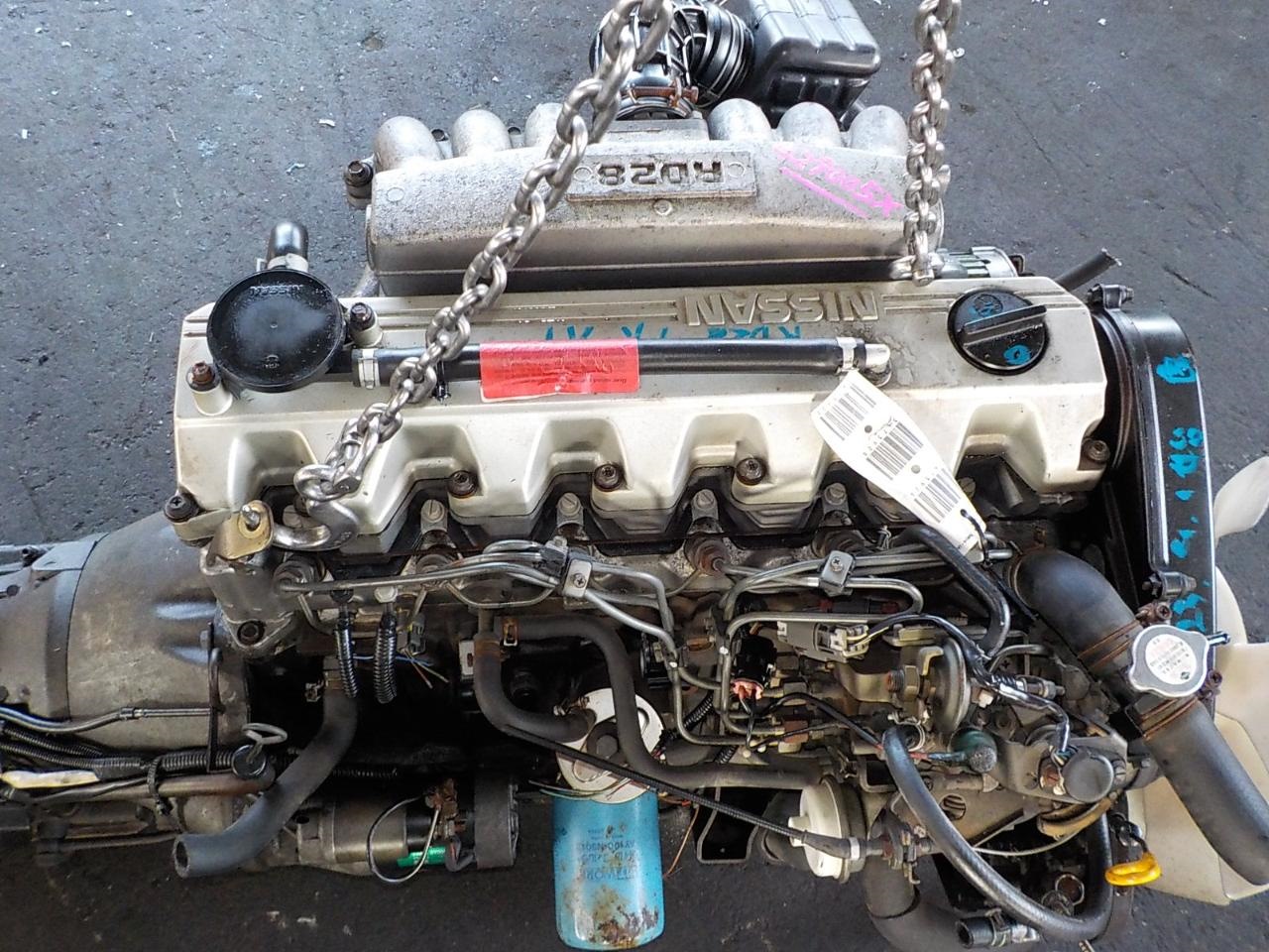 Купить мотор из японии. ДВС Nissan rd28. Двигатель Ниссан РД 28. Ниссан двигатель 6 цилиндров l 28. Двигатель Ниссан 6 цилиндровый.