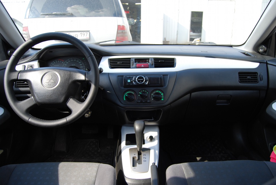 Перетяжка винилом элементов салона Lancer IX — DRIVE2