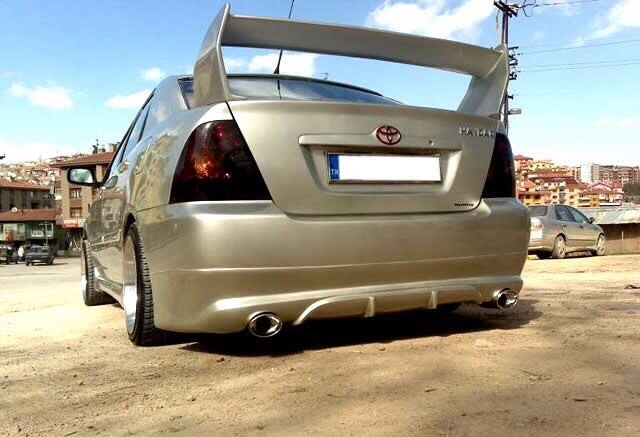 Королла 120 задний. Toyota Corolla 120 кузов Tuning. Toyota Corolla 121 кузов обвесе. Toyota Corolla e120 сзади. Тойота Королла 120 кузов тюнинг.