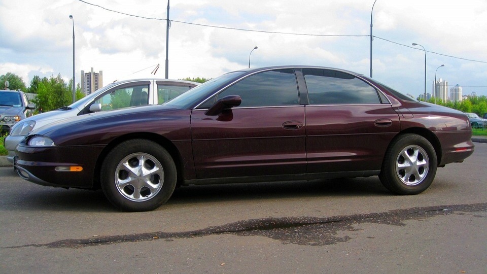 Oldsmobile Aurora 4.0 бензиновый 1995 | 4L V8 Dark Cherry Beauty на DRIVE2