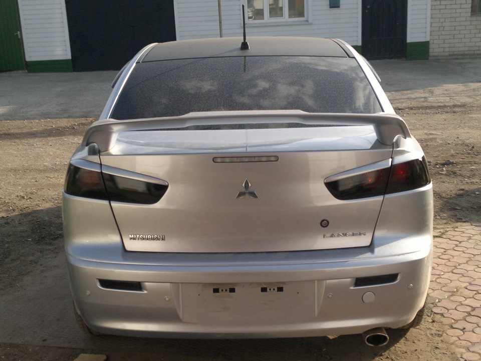 Lancer 10 задние. Mitsubishi Lancer 10 задние фары. Задние фары Лансер 10. Тонировка задних фар Mitsubishi Lancer 10. Mitsubishi Lancer 10 тонировка фар.