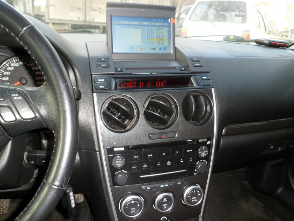 Mazda 6 gg магнитола. Штатная навигация Мазда 6 gg. Штатная магнитола Мазда 6 2006. Магнитола Мазда 6 gg 2006 года штатная.
