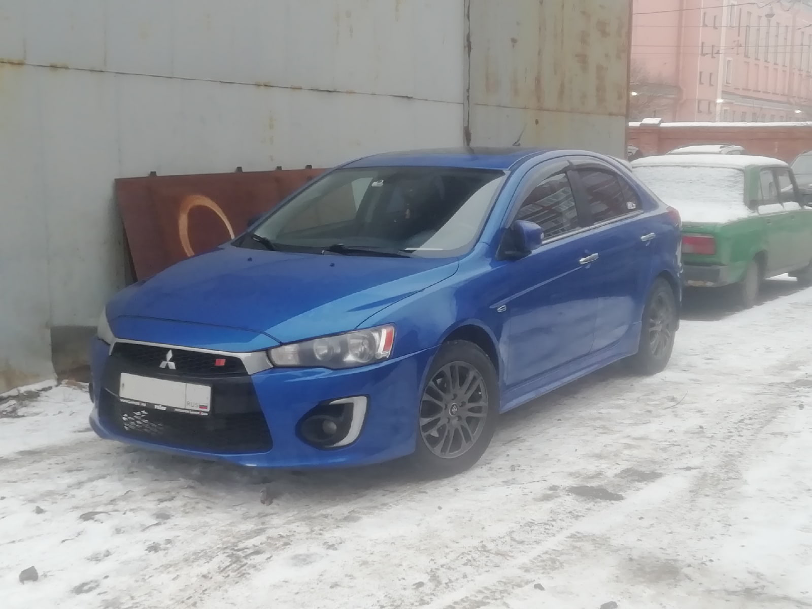 Установил оригинальные накладки на пороги — Mitsubishi Lancer X, 1,8 л,  2008 года | аксессуары | DRIVE2